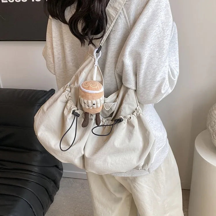 Ultra-light pleated crossbody student cloth bag in polyester with folding design and internal phone compartment