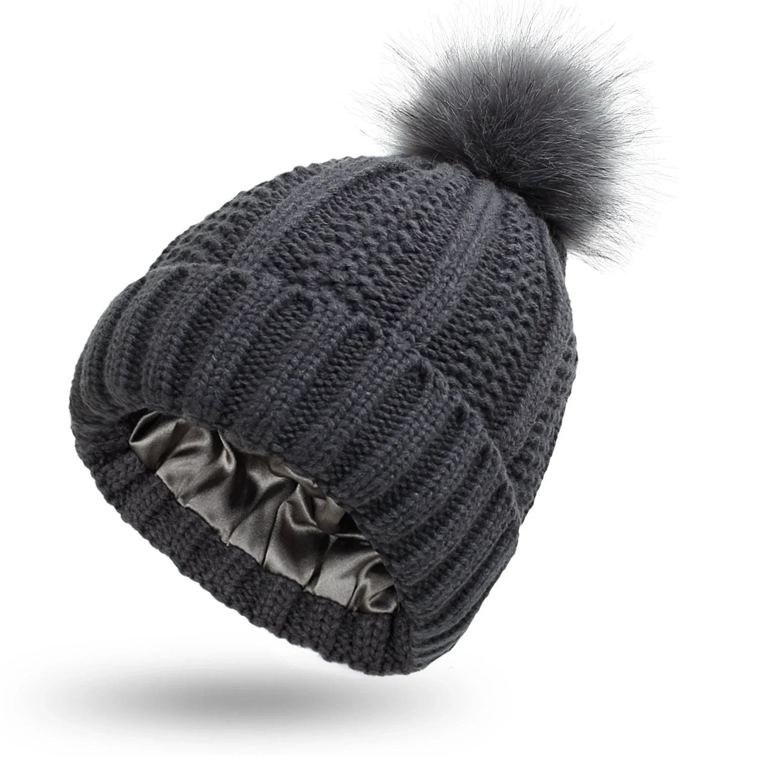 Cozy satin-lined knit beanies with pom poms in various colors for women's winter fashion