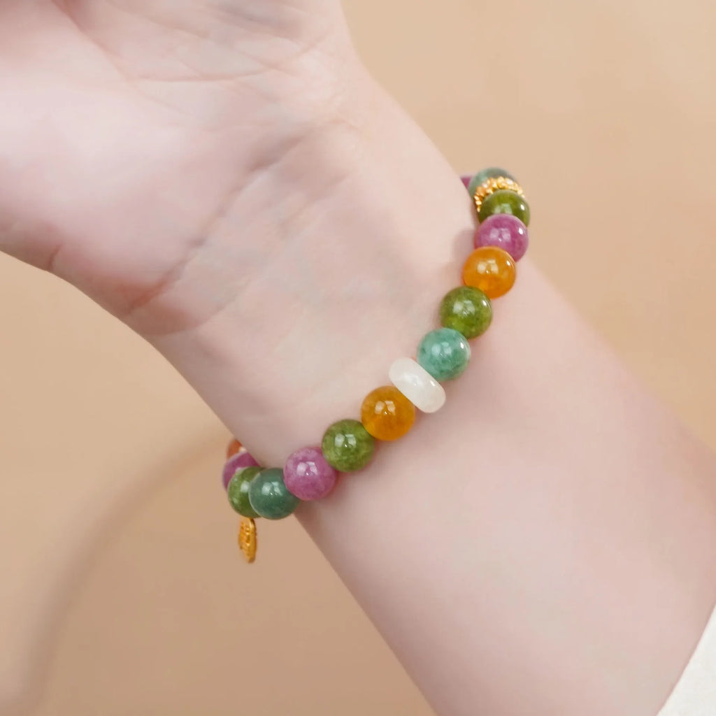 Rainbow coloured electroplated half bracelet for women made from jade and tourmaline.