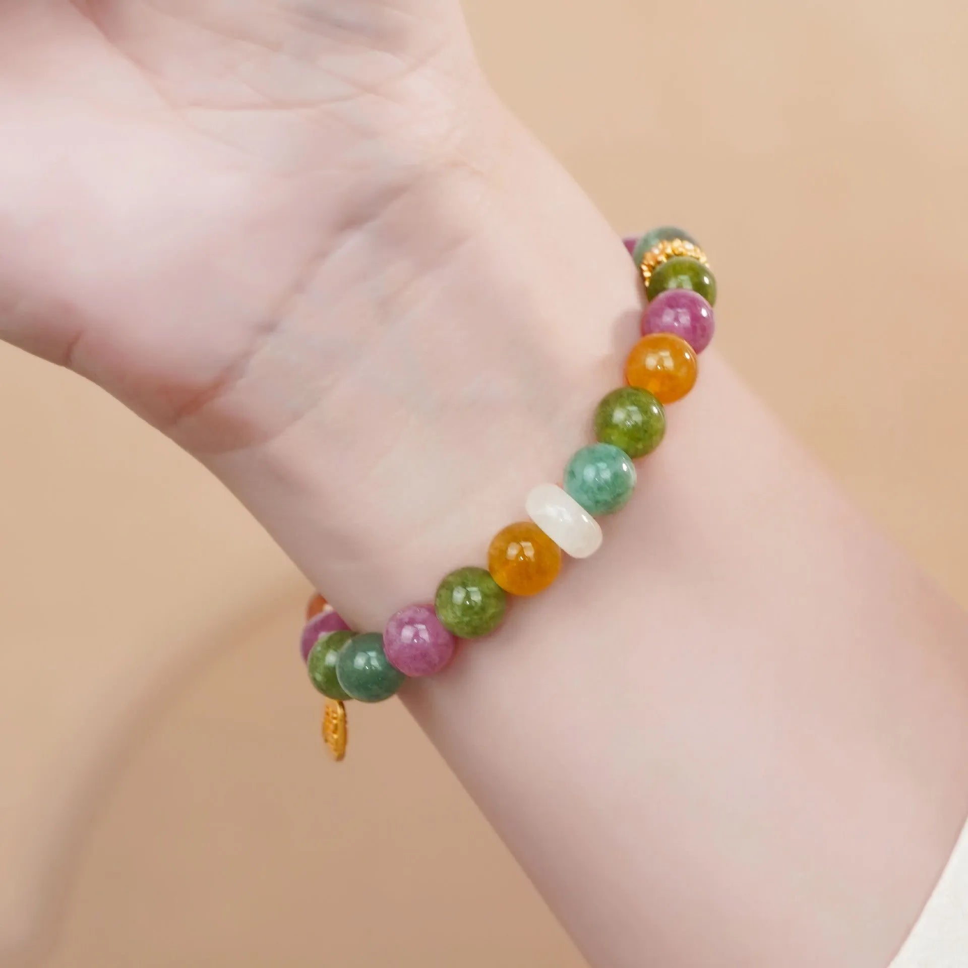 Rainbow coloured electroplated half bracelet for women made from jade and tourmaline.