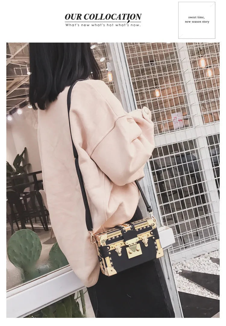 Hard PU women's shoulder bag with flap closure and cross body strap in black or green