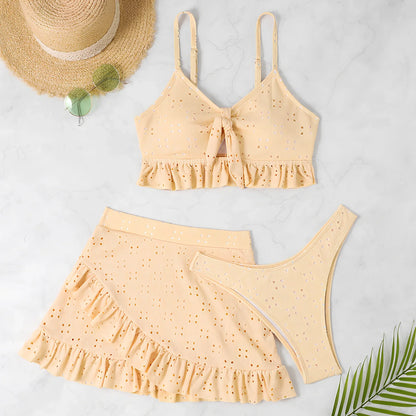 Women's 3-piece bikini set with hip-hugging skirt and ruffle detailing in polyester swimwear