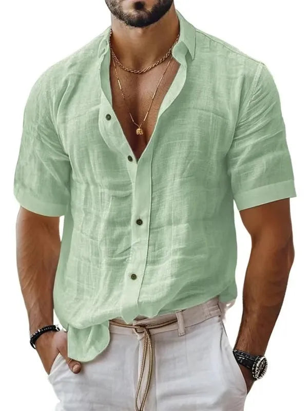 Men's solid colour short sleeve lapel shirt in a cotton linen blend fabric on a hanger.