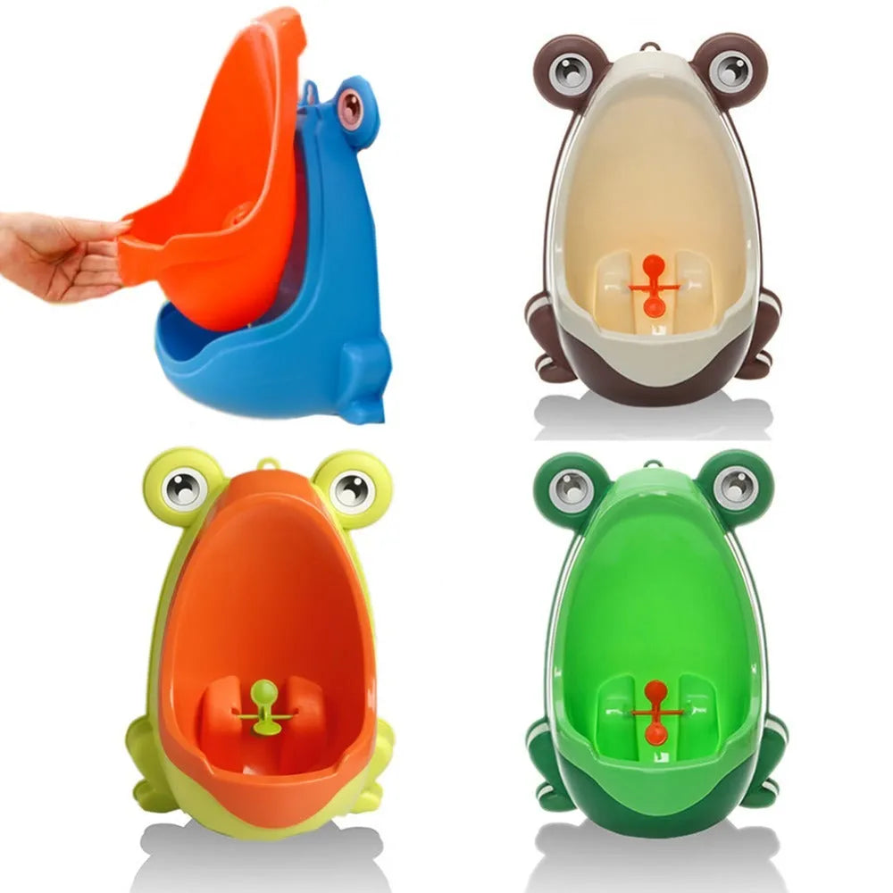 Frog-shaped baby potty toilet in yellow orange with rotating windmill and sucker base