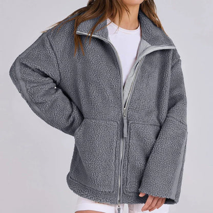 Stylish women's fleece zip-up jacket with pockets in various colours