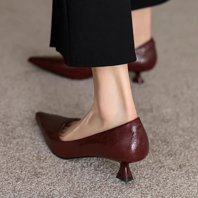 Women's solid colour French pointed-toe mid heel cowhide pumps in black with stiletto heel