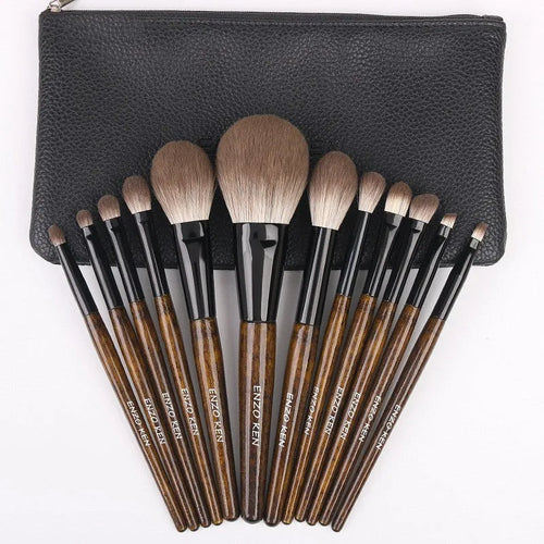 12-piece wooden handle makeup brush set with a powder brush in a grey PU pouch