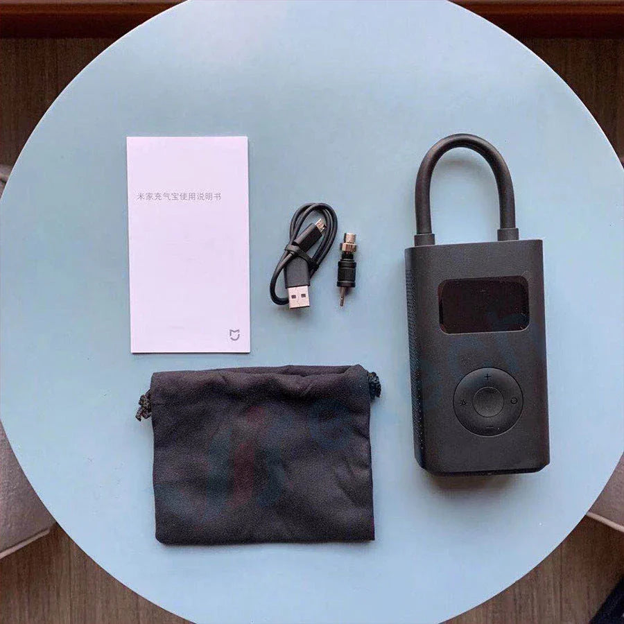 Mijia Mini Portable Car Air Pump with digital display and compact design