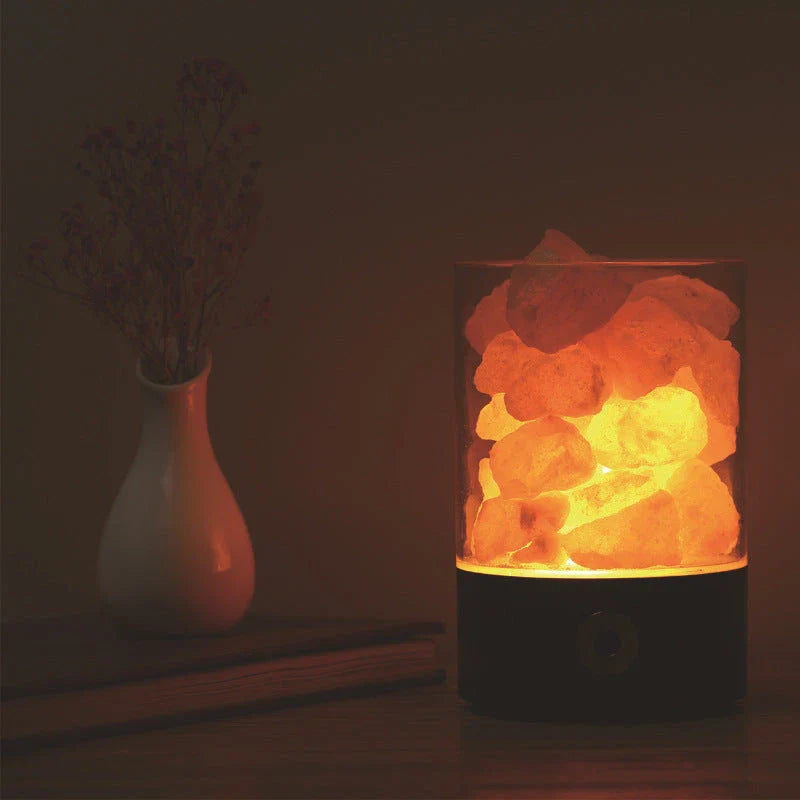 Himalayan salt lamp with natural pink-orange glow, releasing negative ions to purify the air and create a calming, relaxing atmosphere