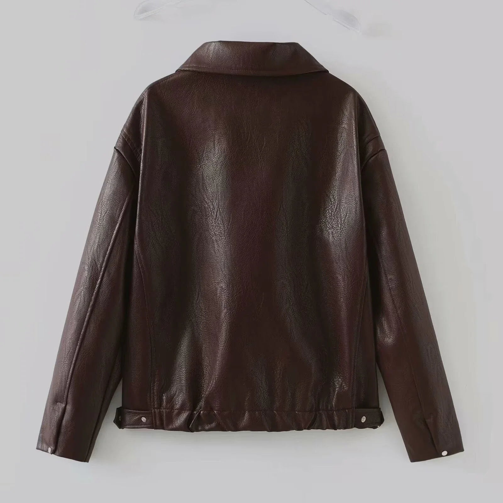 Stylish women's leather jacket with zipper detail in burgundy and black
