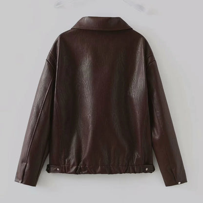 Stylish women's leather jacket with zipper detail in burgundy and black