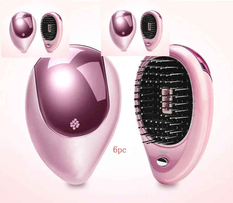 Portable negative ion hair comb with sound wave vibration technology in pink and green