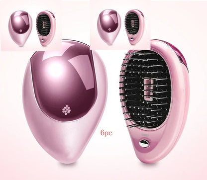 Portable negative ion hair comb with sound wave vibration technology in pink and green