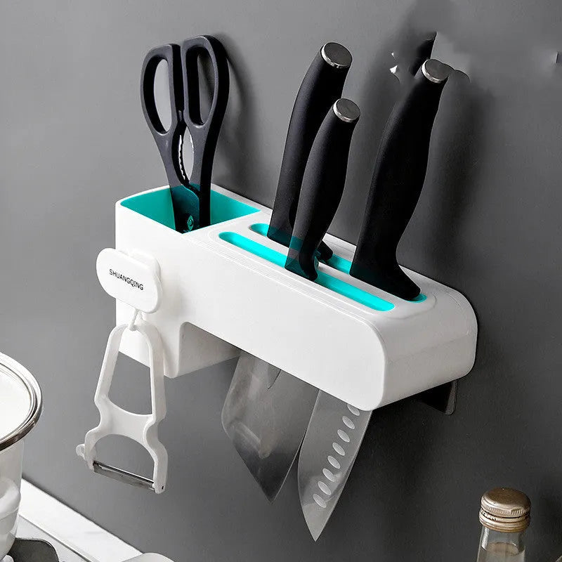 White plastic kitchen knife rack mounted on wall with dimensions 10.6 cm wide by 26 cm tall