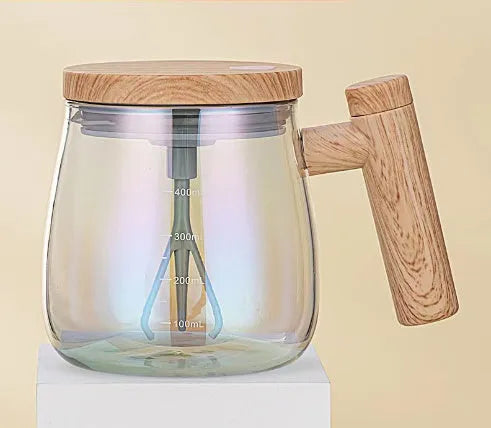400ml automatic self-stirring coffee mug in borosilicate glass with electric mixing button.