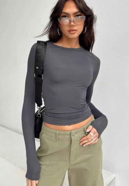 Women's slim-fit long-sleeved pullover top in solid colours