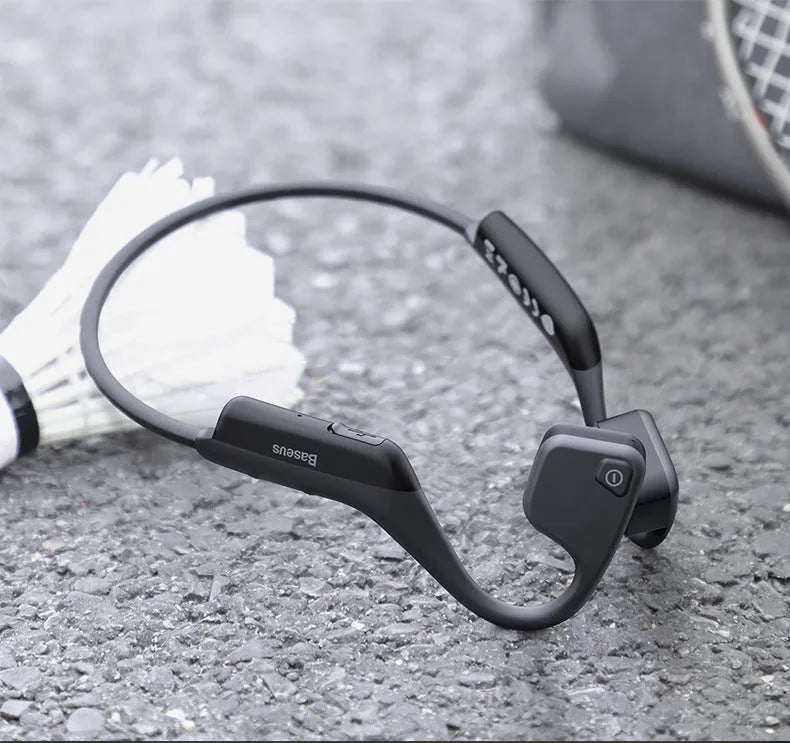 Black stereo waterproof wireless running headphones with hanging ear design