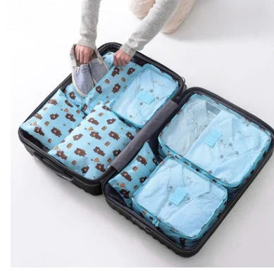 Durable waterproof packing cubes in various colors for organized, efficient travel