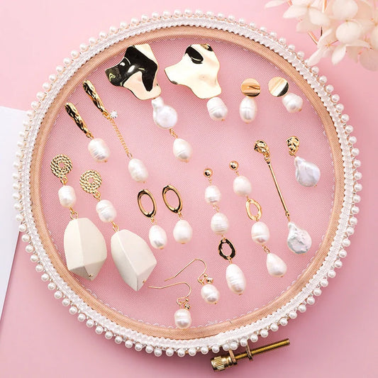 Vintage geometric pearl asymmetric earrings with 925 silver hooks, perfect for adding elegance to any outfit.