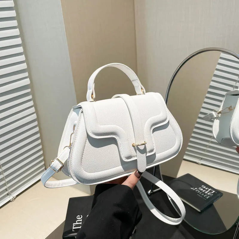 Urban Simplicity PU shoulder bag in horizontal square shape with sewing thread detail, available in black colour