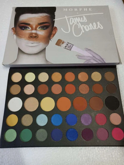 39-colour earth tone eyeshadow palette showing pearlescent and matte finishes in compact with mirror