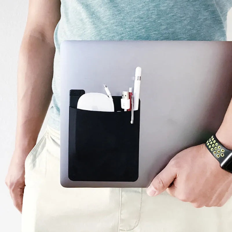 Black adhesive laptop back storage bag with pen loop, 15x12cm, stuck to laptop back