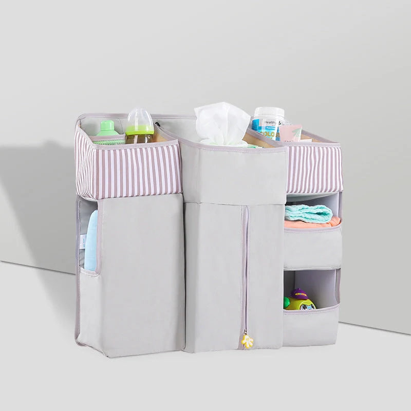 Universal baby crib hanging storage bag in durable Oxford cloth, available in multiple colours
