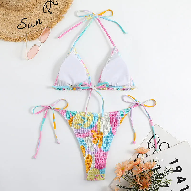 Women's triangle bikini swimsuit with floral gradient pattern and smocking craft detailing