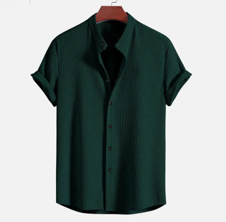 Short sleeve loose polyester fibre men's summer shirt in light blue, shown front view on plain background
