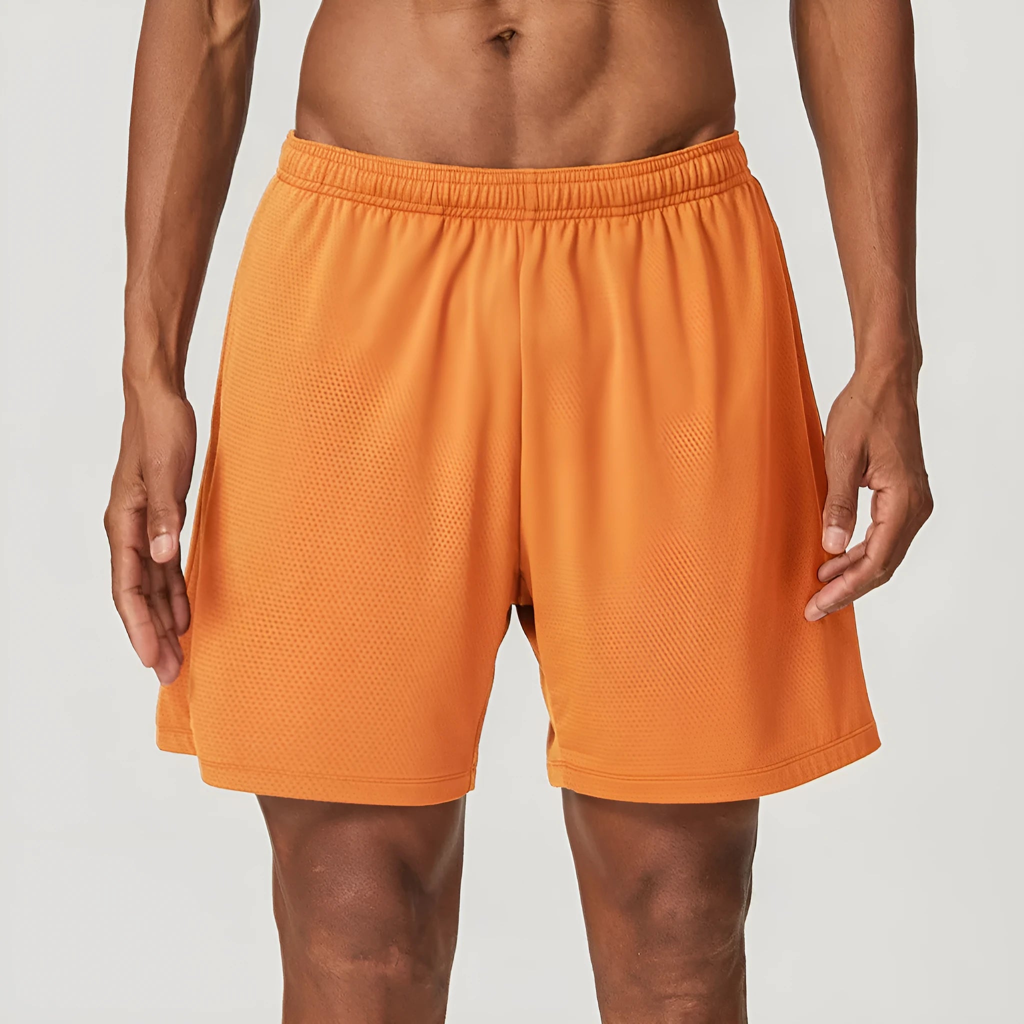 Men's quick-drying double-layer running shorts in sky green colour, laid flat to show mid-waist fit and shorts length.