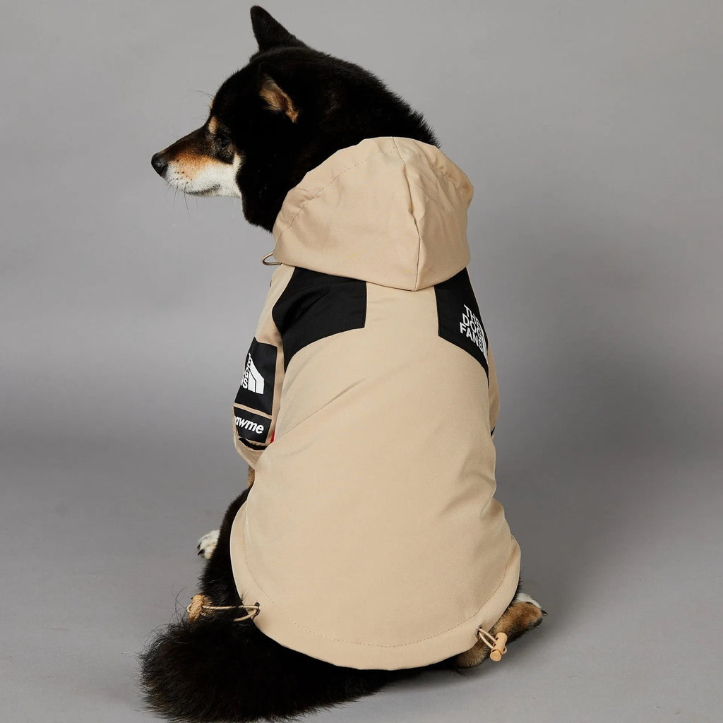 Khaki coloured polyester shell jacket for a dog, shown on a mannequin.