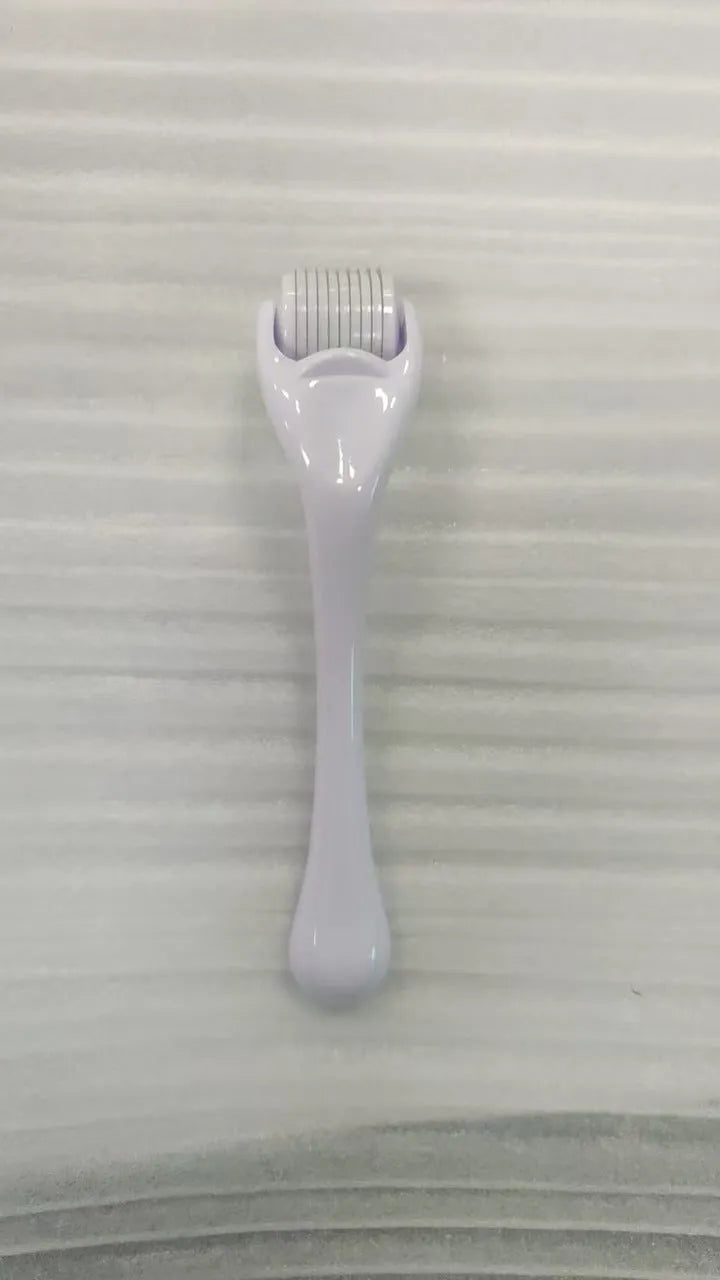 540 needle microneedle derma roller with colour wheel on black handle, showing 0.25mm specification.