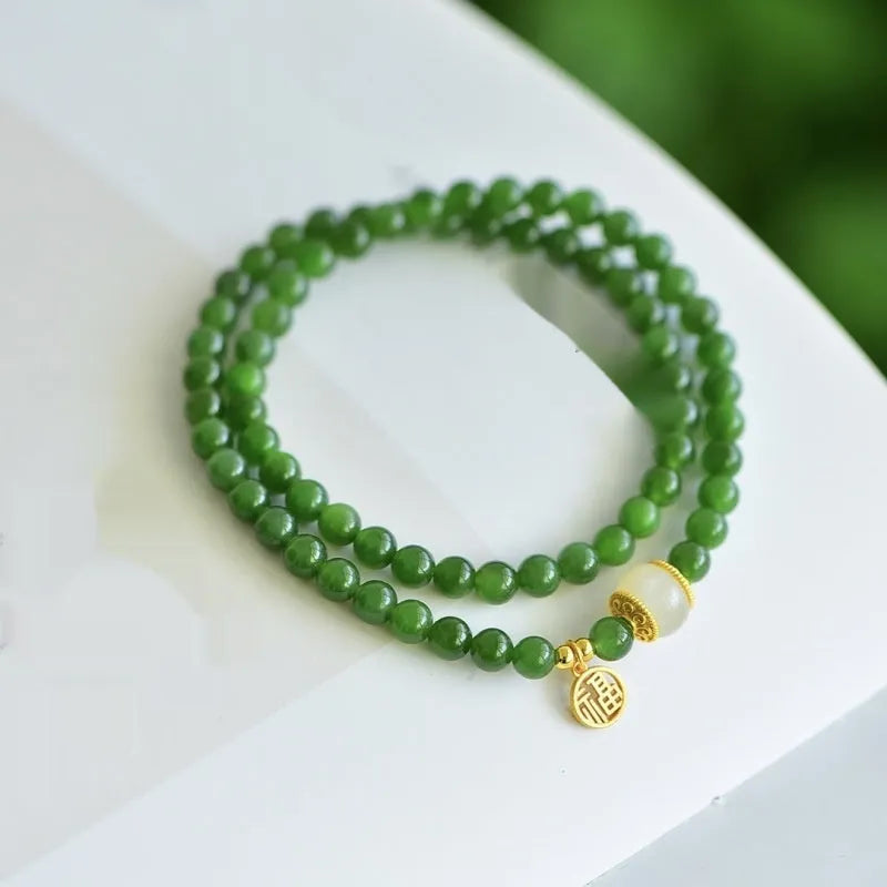 Women's double circle bracelet made of natural Hetian jade featuring a fu character, 6mm size.