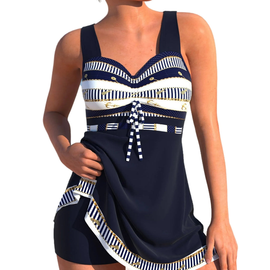 Plus size woman modelling a blue split skirt bikini swimsuit with backless design.