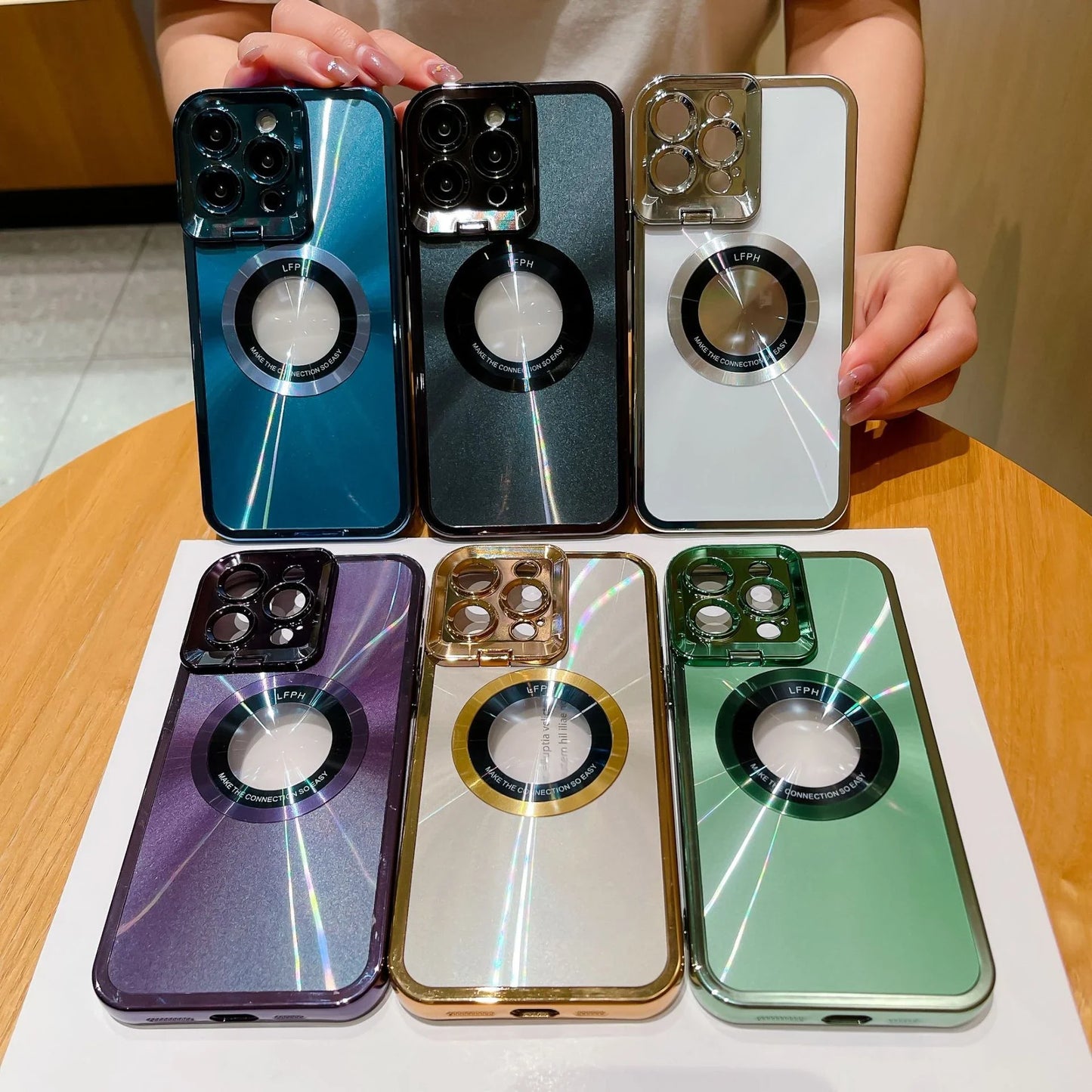 Stylish magnetic protective case for iPhone 14, 13, and 12 series with electroplated finish, MagSafe compatibility, and reinforced corners for superior protection.