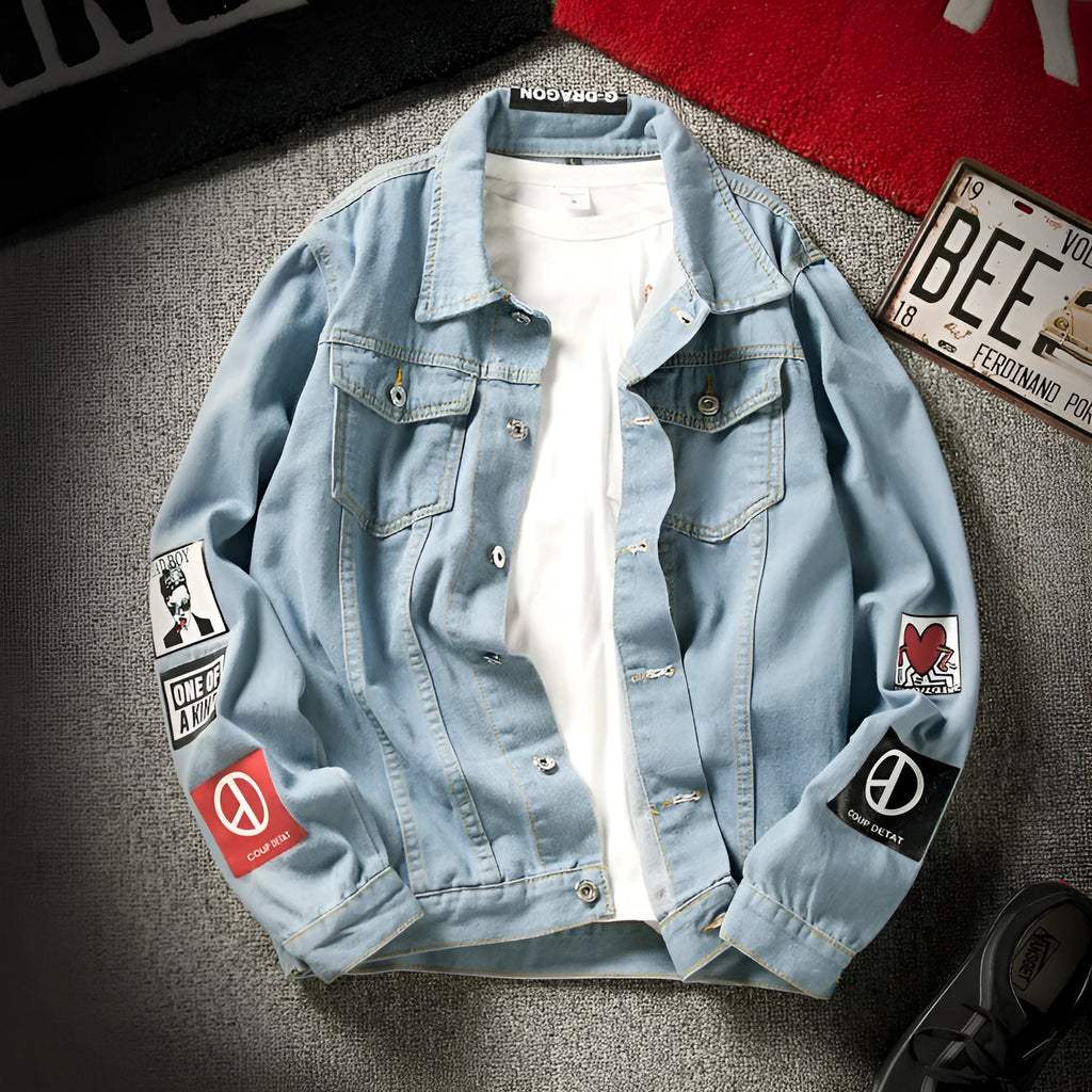Men's blue denim jacket with lapel collar, single-breasted front, and side seam pockets on a model