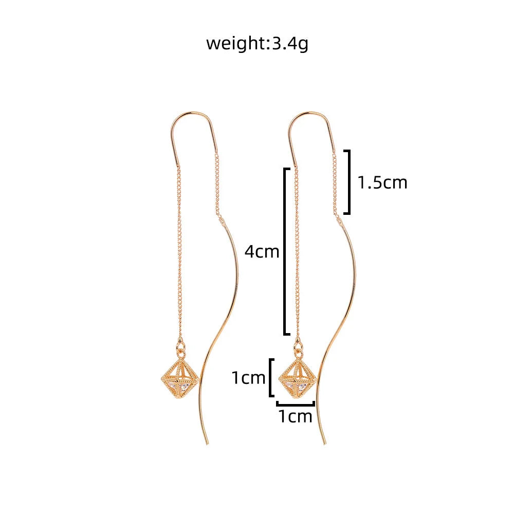 Gold Bronze Cutout Zircon Tassel Earrings with European design and sparkling accents