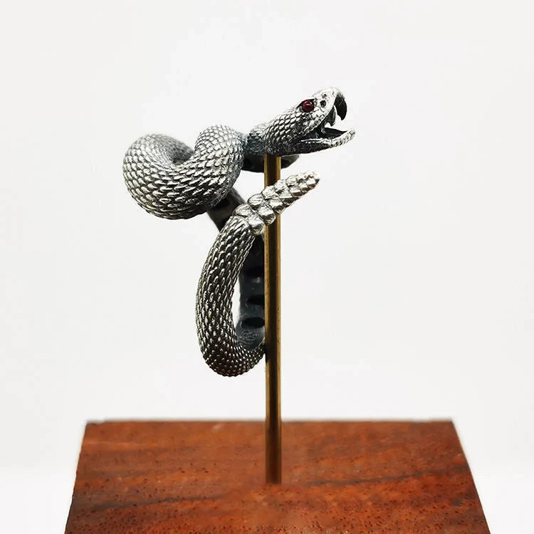 Adjustable copper snake ring in black and white with gold tail options