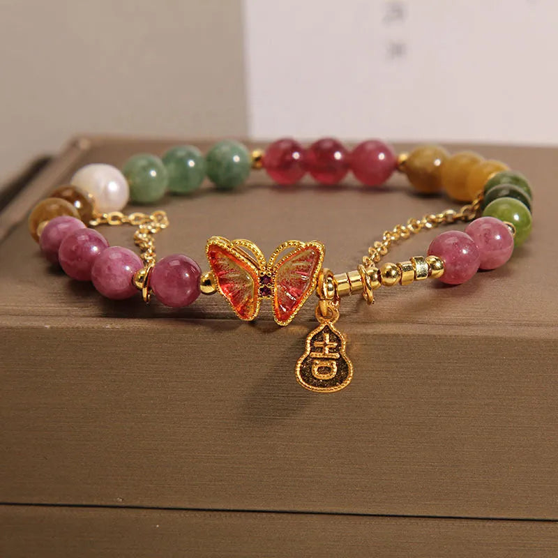 Natural jade green agate bracelet with a carved tourmaline butterfly gourd centrepiece.