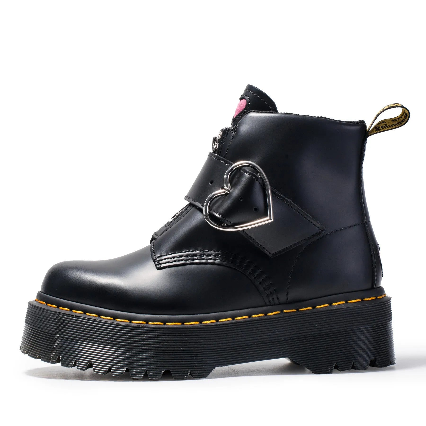 Women's black leather ankle boots with chunky heel, lace-up front, side zip, and belt buckle detail on a waterproof platform