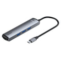 Non-Apple branded Type-C docking station in dark grey with mechanical eye design compatible with MacBook and iPhone
