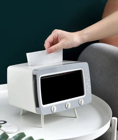 Charming cartoon tissue box organizer in various colors, with integrated phone stand for hands-free media viewing