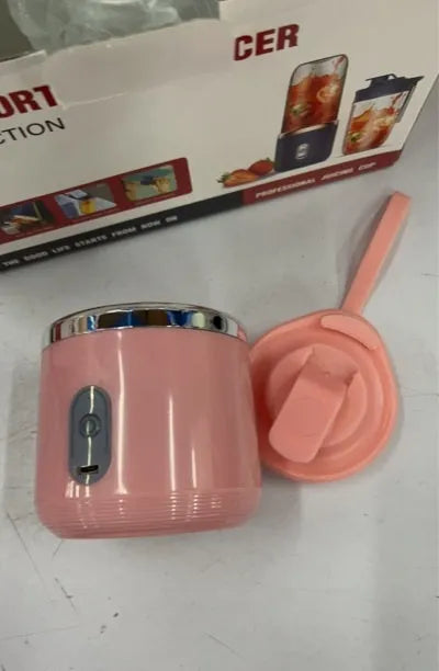 Tunisian dark blue portable blender and juicer with six blades, USB cable, and 400ml cup.