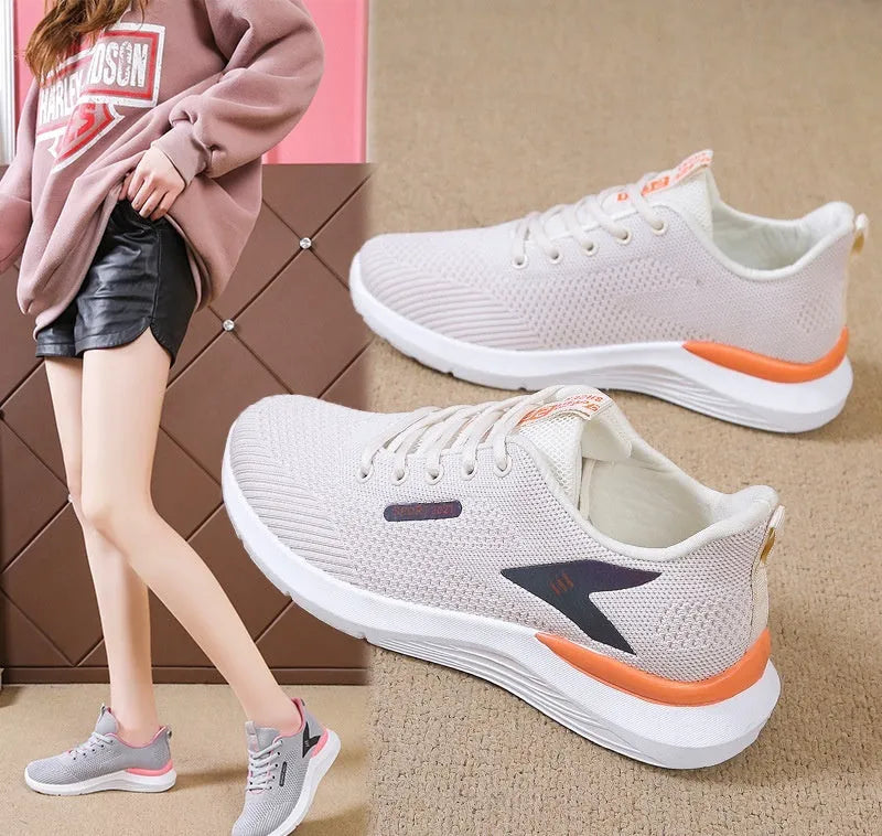 Low-top women's casual running shoes in beige with mesh upper, round toe, and front lace-up closure