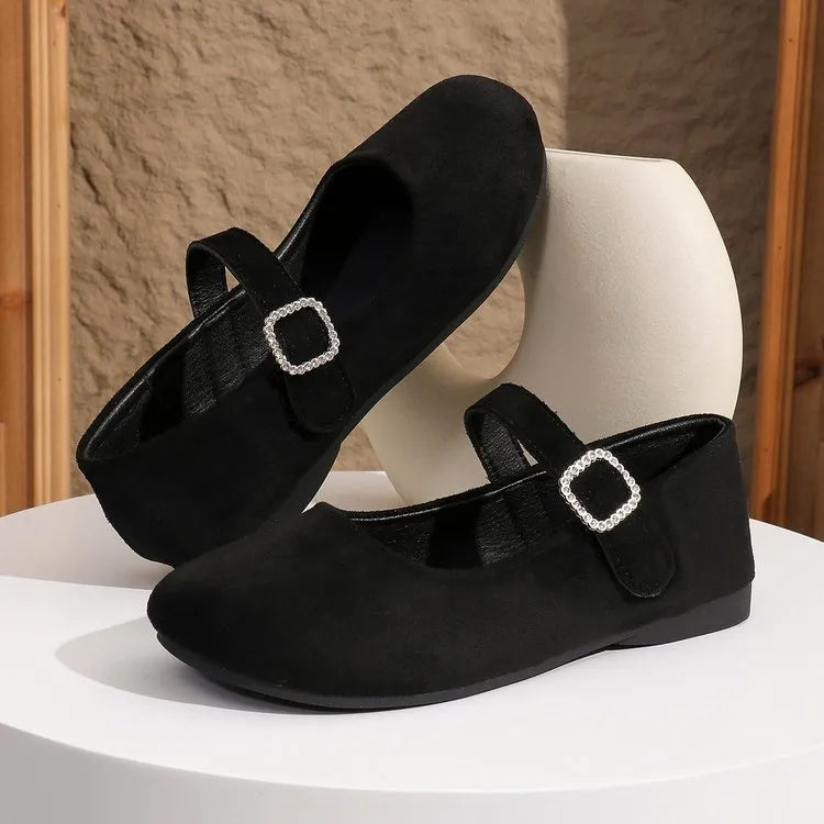 Men's black low-top canvas fisherman slip-on shoes with a flat rubber sole