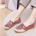 Women's flat heel ethnic cloth shoes in blue with colour stitching detail on a low-top, shallow mouth design.