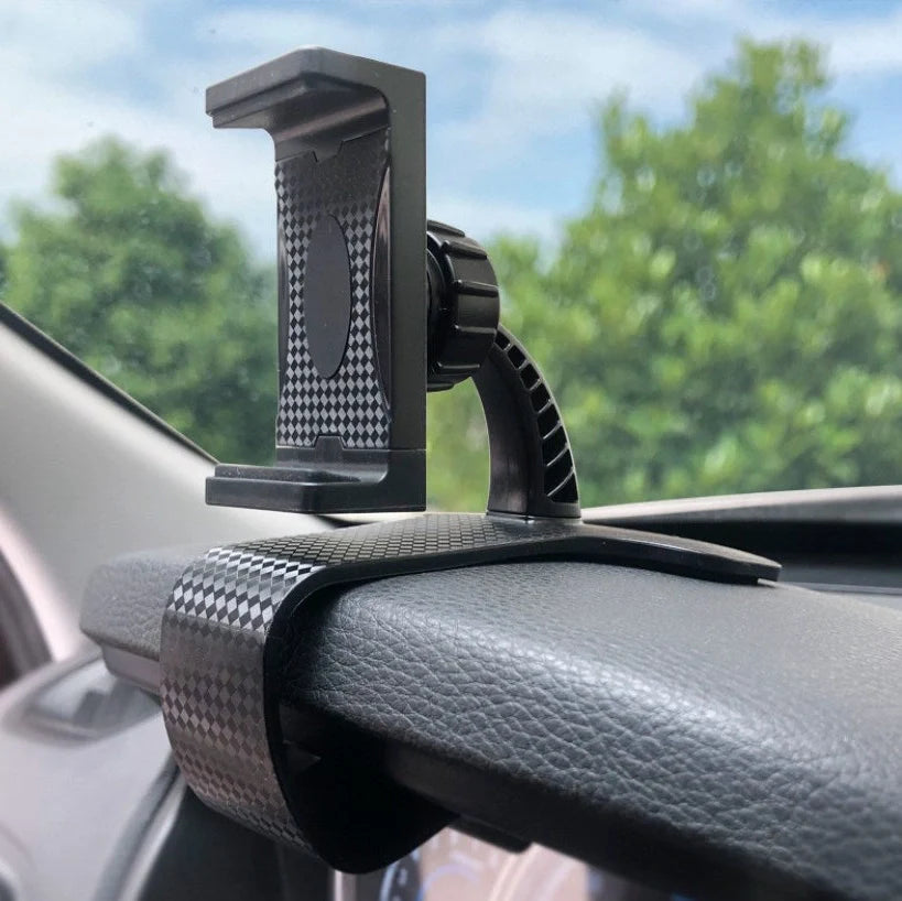 Dashboard-mounted car phone holder with adjustable ball head and stretchable silicone clip for conventional smartphones