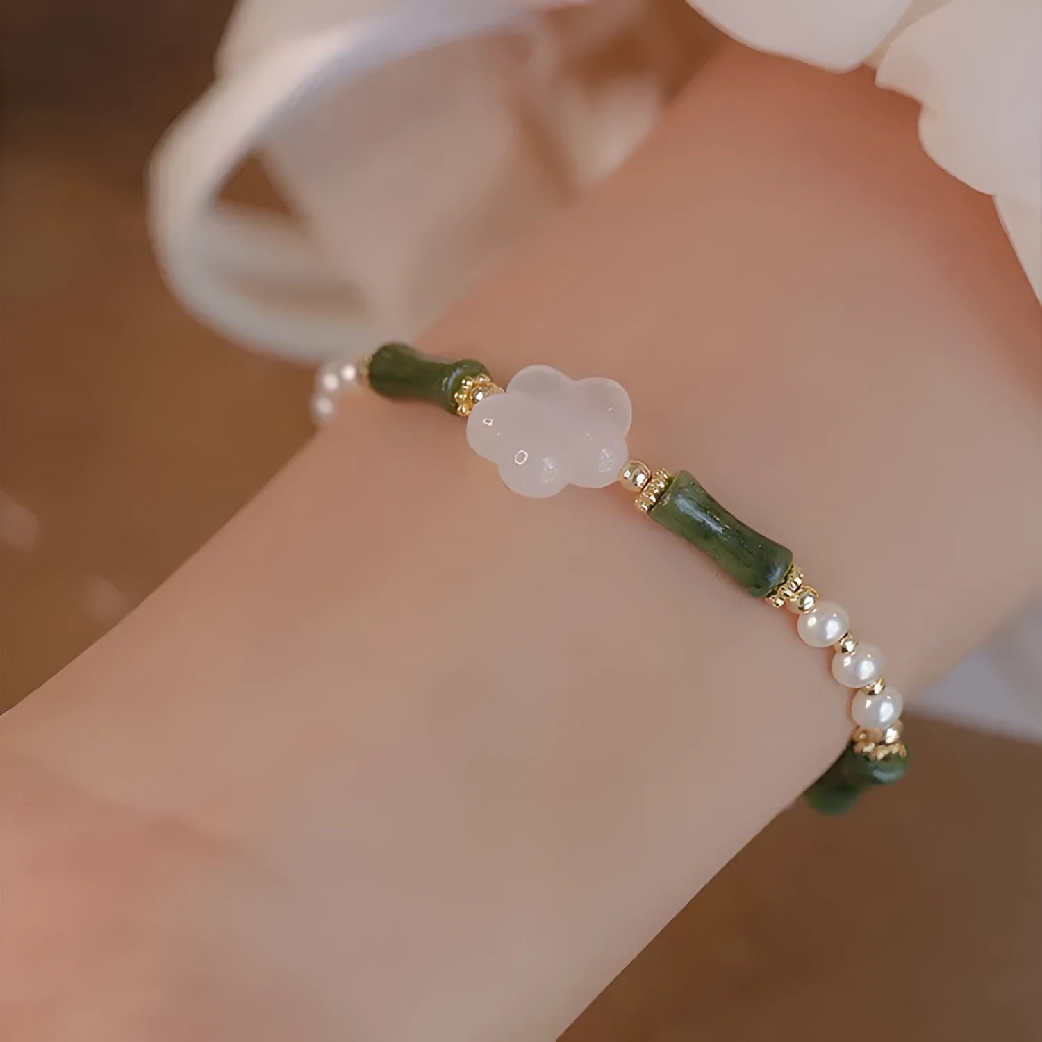 Olive green Hetian jade and copper bead bamboo joint bracelet with antique finish
