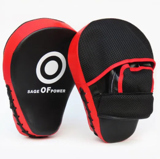 Red and black martial arts hand target kick pad for boxing and taekwondo training drills.