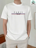 Man modelling a loose-fit, short-sleeved, letter-print T-shirt in pure cotton, shown in apricot colour.